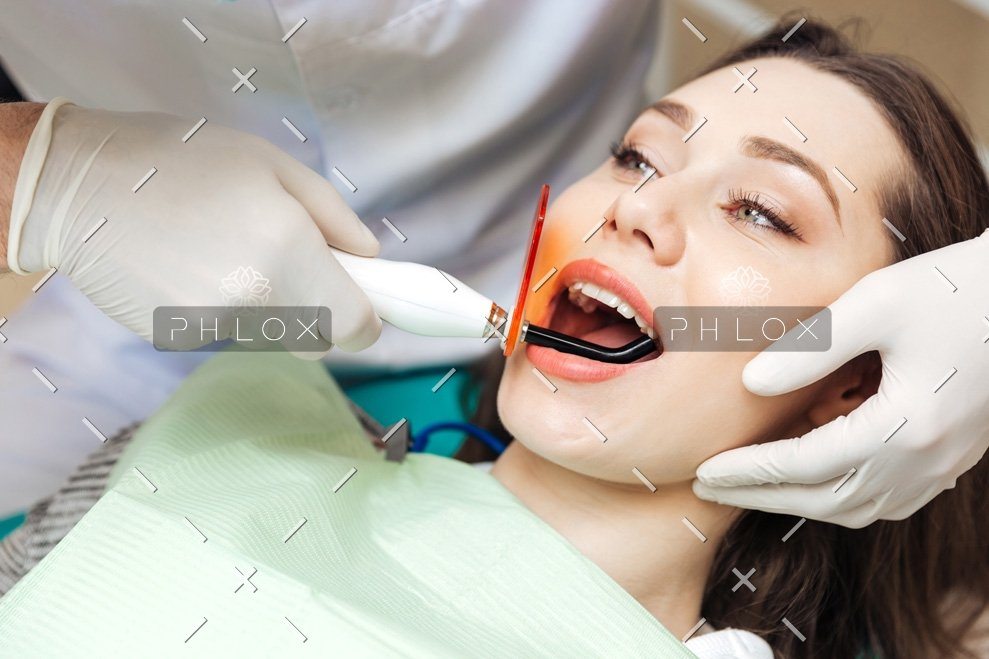 demo-attachment-43-close-up-portrait-of-a-girl-getting-her-teeth-PVTMTVA